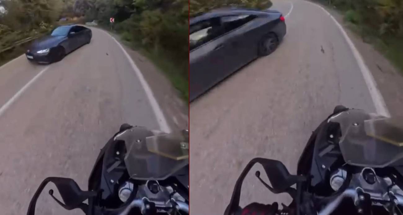 MOTOSİKLETLİNİN SANİYELERLE ÖLÜMDEN KURTULDUĞU ANLAR KAMERAYA YANSIDI