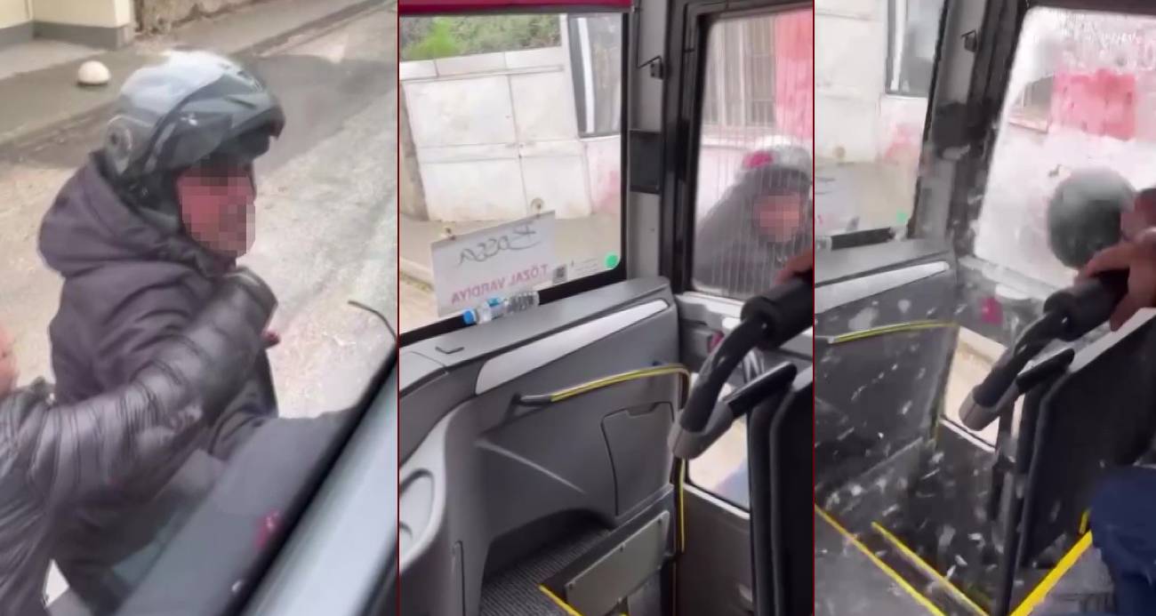 TRAFİKTE TARTIŞTIĞI SERVİS ARACININ CAMINI KASKIYLA KIRDI 