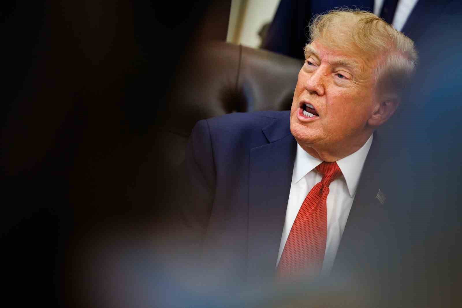 TRUMP, RUSYA VE İRAN’I HEDEF ALAN YAPTIRIM TASARISINI İMZALADI